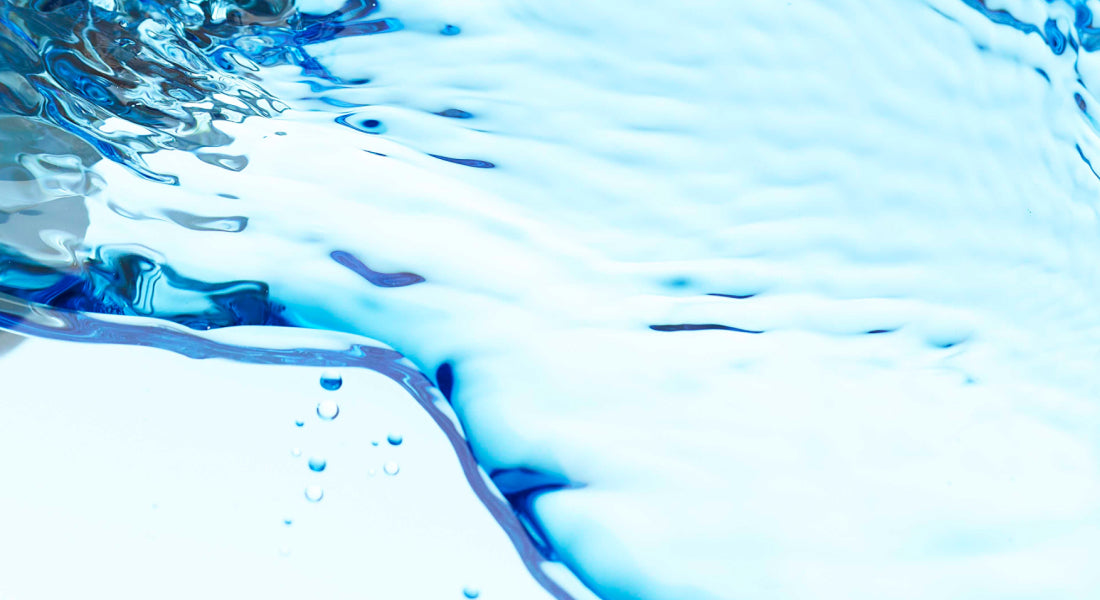 Close-up of blue water surface with ripples