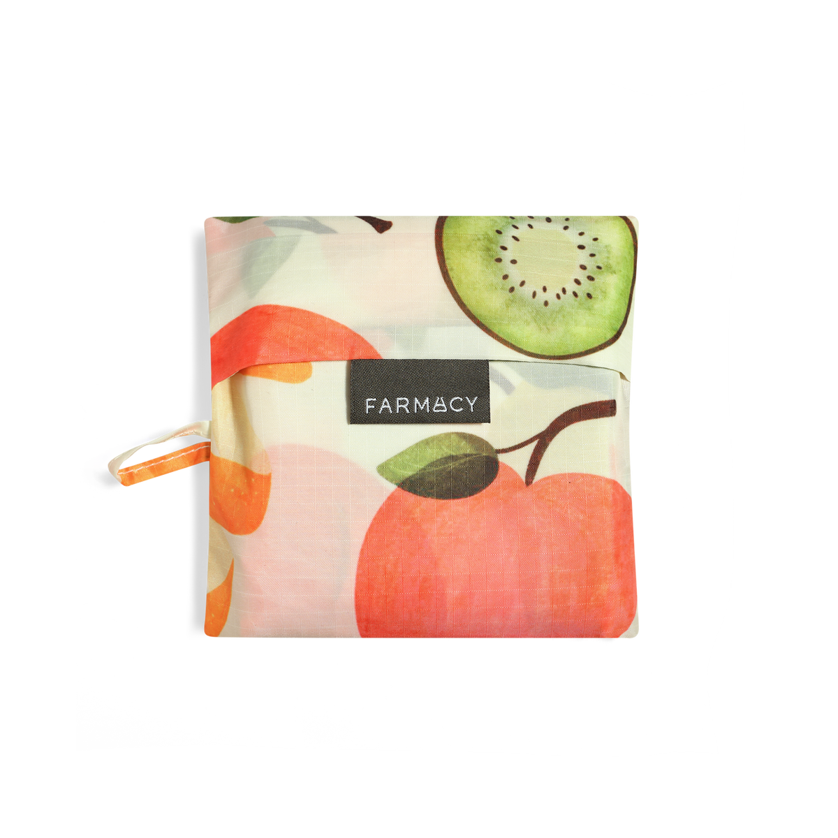 A square reusable fabric pouch with a fruit print featuring a peach, kiwi slice, and green leaves, with a black label reading 'FARMACY' and a small orange loop on the left side, shown on a white background