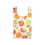 Farmacy x Baggu reusable plastic shopping bag with a watercolor-style fruit print featuring oranges, apples, pears, and kiwi slices on a white background