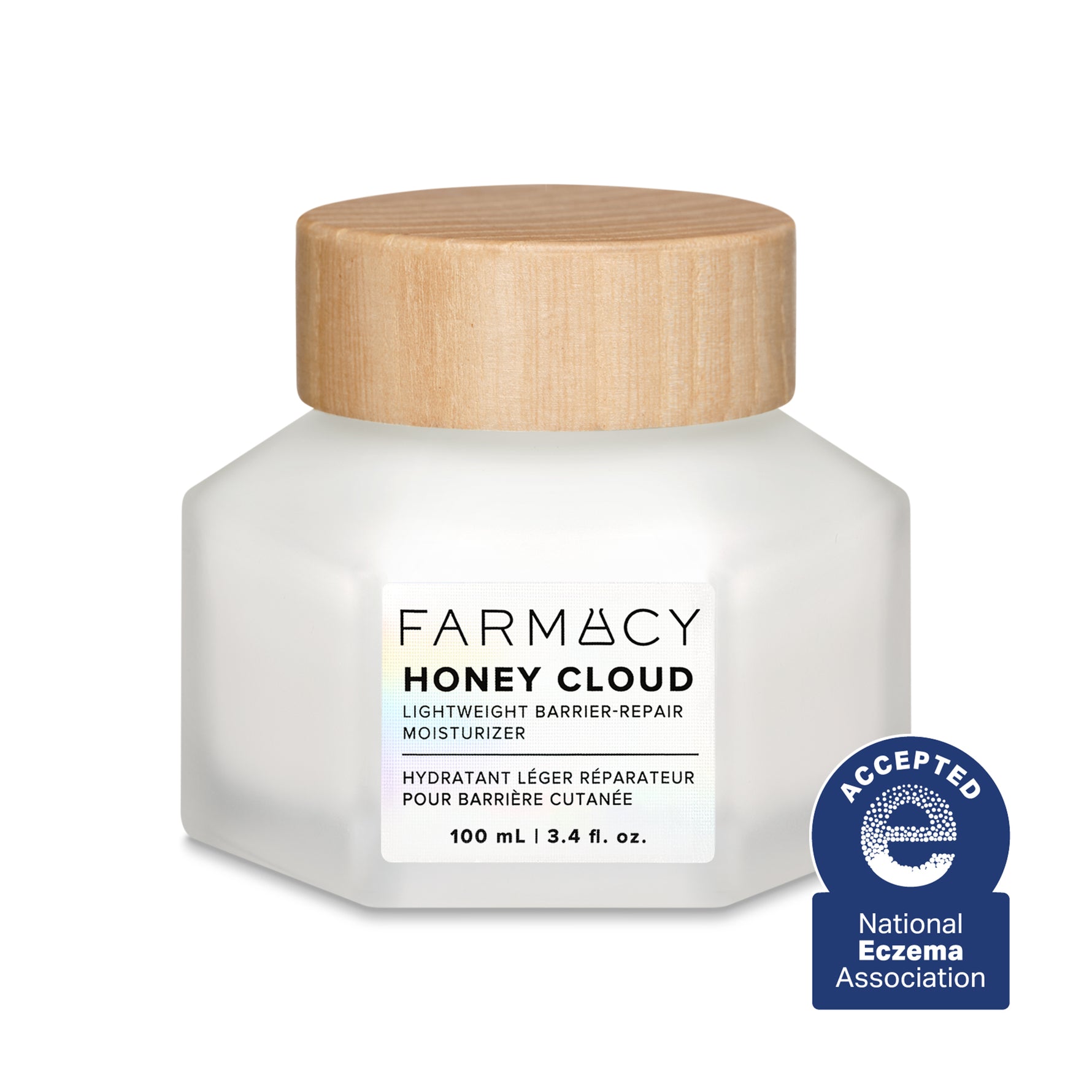 Farmacy Honey Cloud moisturizer jar with wooden cap on a white background
