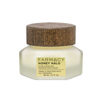 A jar of FARMACY Honey Halo Ultra-Hydrating Ceramide Moisturizer with a wooden cap