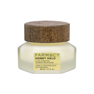 A jar of FARMACY Honey Halo Ultra-Hydrating Ceramide Moisturizer with a wooden cap
