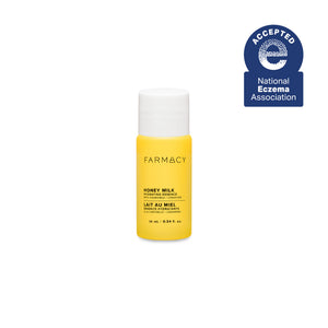 Yellow bottle of Farmacy Honey Milk product on a white background with National Eczema Association acceptance badge.