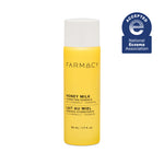 Yellow bottle of Farmacy Honey Milk Hydrating Essence on a white background with National Eczema Association acceptance badge.