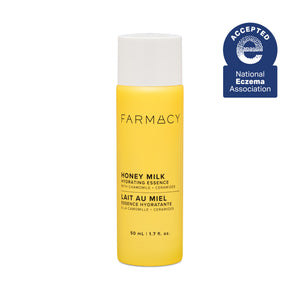 Yellow bottle of Farmacy Honey Milk Hydrating Essence on a white background with National Eczema Association acceptance badge.